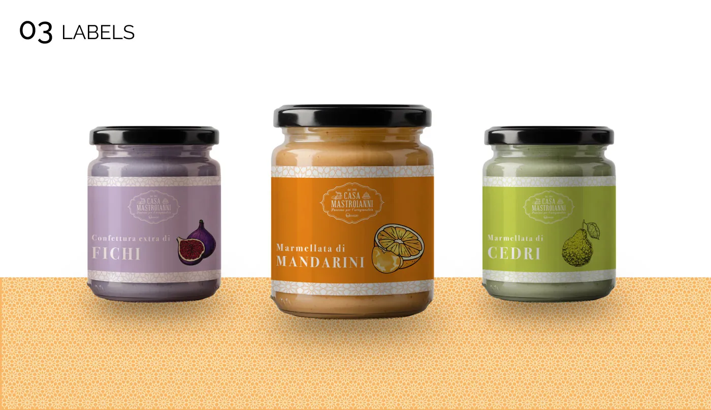 Tre vasetti Casa Mastroianni con etichette lilla, arancione e verde: fichi, mandarini e cedri