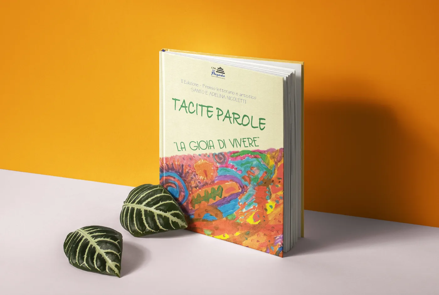 Copertina del libro Tacite parole, La gioia di vivere, con un disegno a colori vivaci